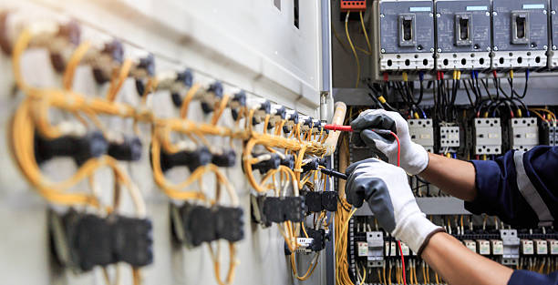 Professional Electrician technician working in Ormond Beach, FL